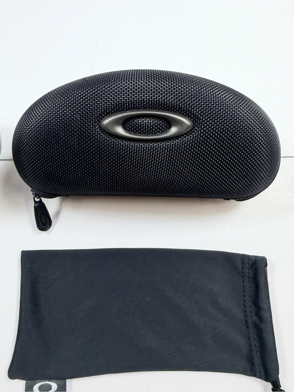 Oakley Black & Silver Hard Cases with Seven Black Microfiber Pouches